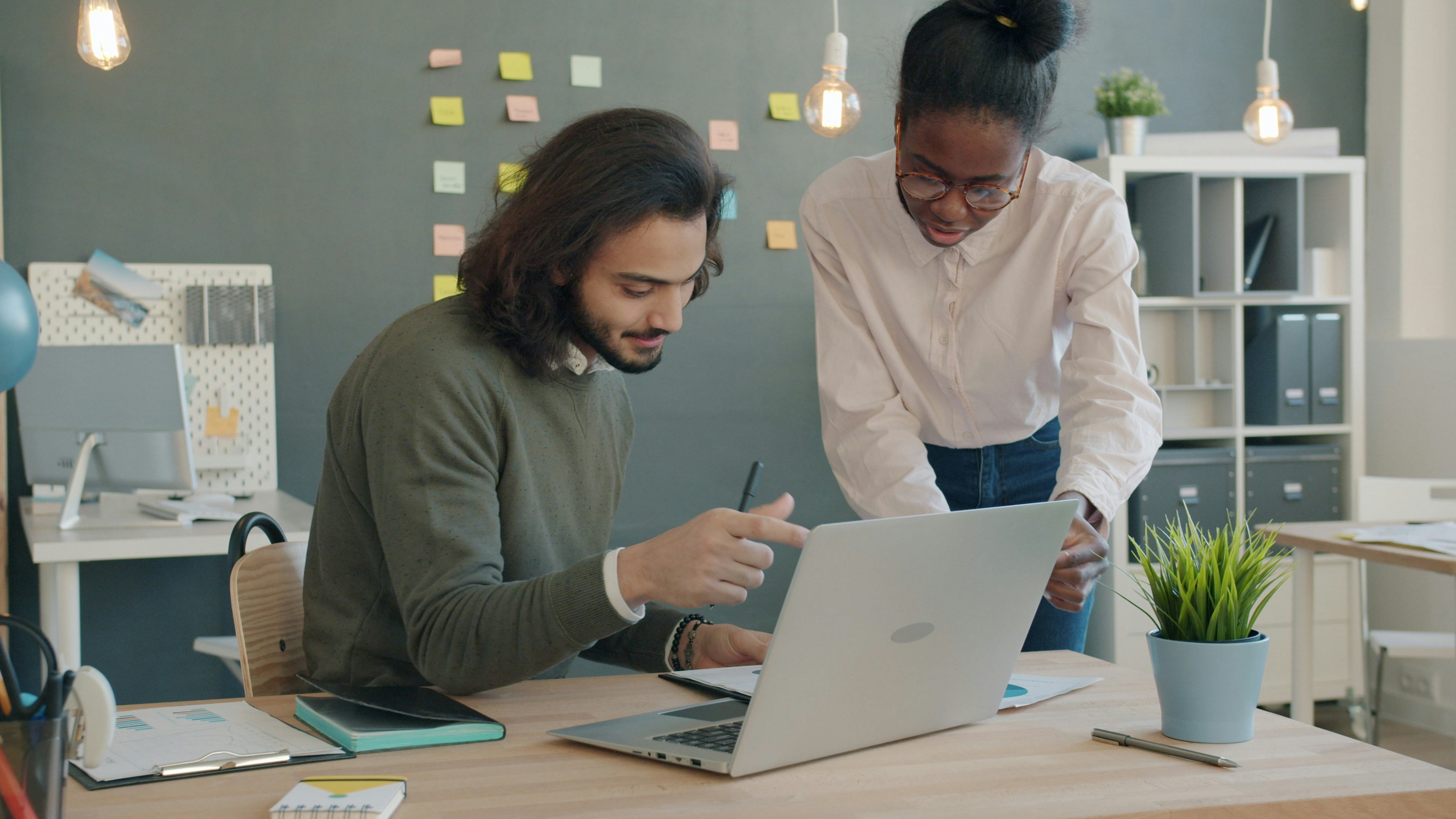 People analysing information together in an office